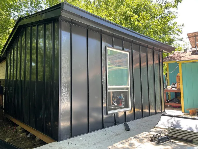 Black standing seam metal wall panels for Metal Roof Installation in Milliken