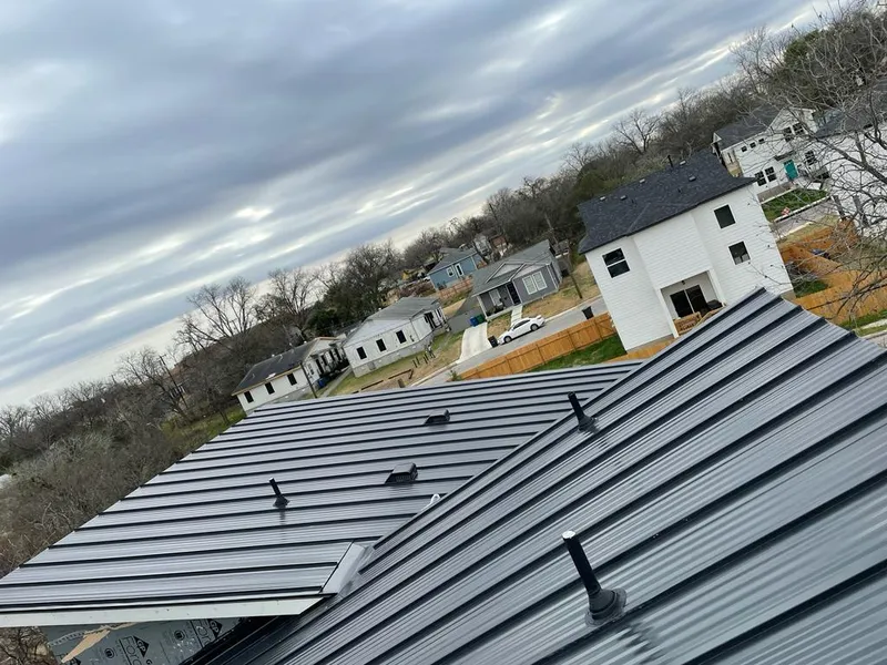 Standing seam metal roof panels with vents for Skylight Repair in Milliken